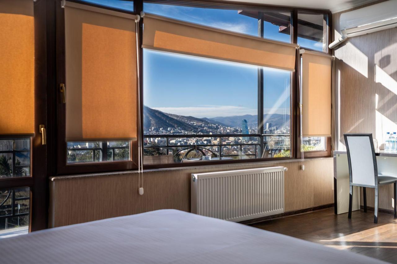 טביליסי Siberia Hotel מראה חיצוני תמונה A room at the hotel